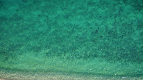 Turquoise sea texture from an aerial shot