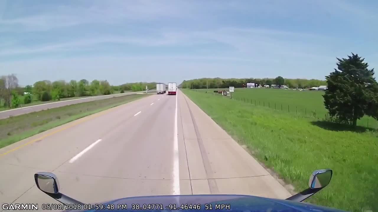 Damaged Tire Of Passing Truck Blows With Loud Sound