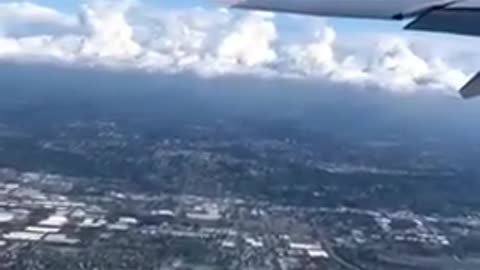 Areoplane seen from clouds