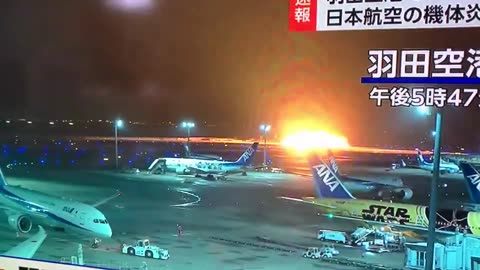 A Japan Airlines plane caught fire on the runway at Haneda Airport in Tokyo
