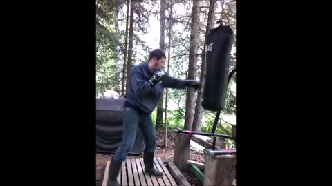 Hitting a modified Everlast 100 lb bag