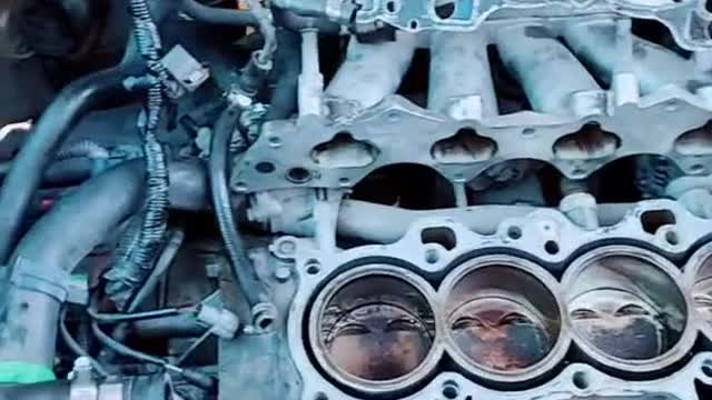 The repairman was confronted with a jumble of configurations inside the engine