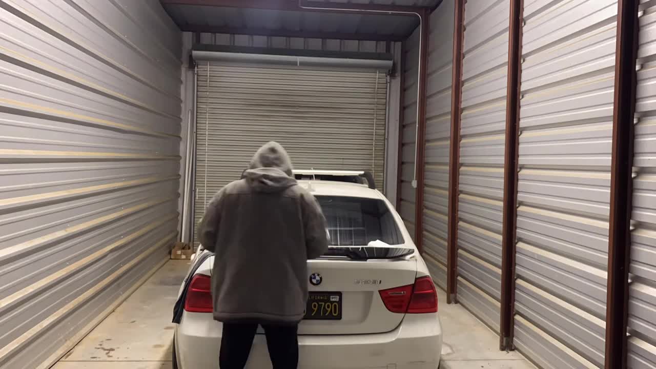 installing a gloss black eBay wing on my Bmw n54 335i