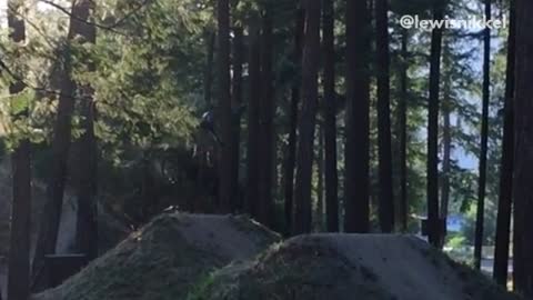Collab copyright protection - guy in woods jumps off bike crash