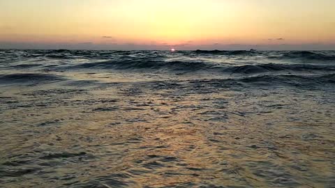 sunset and sea waves
