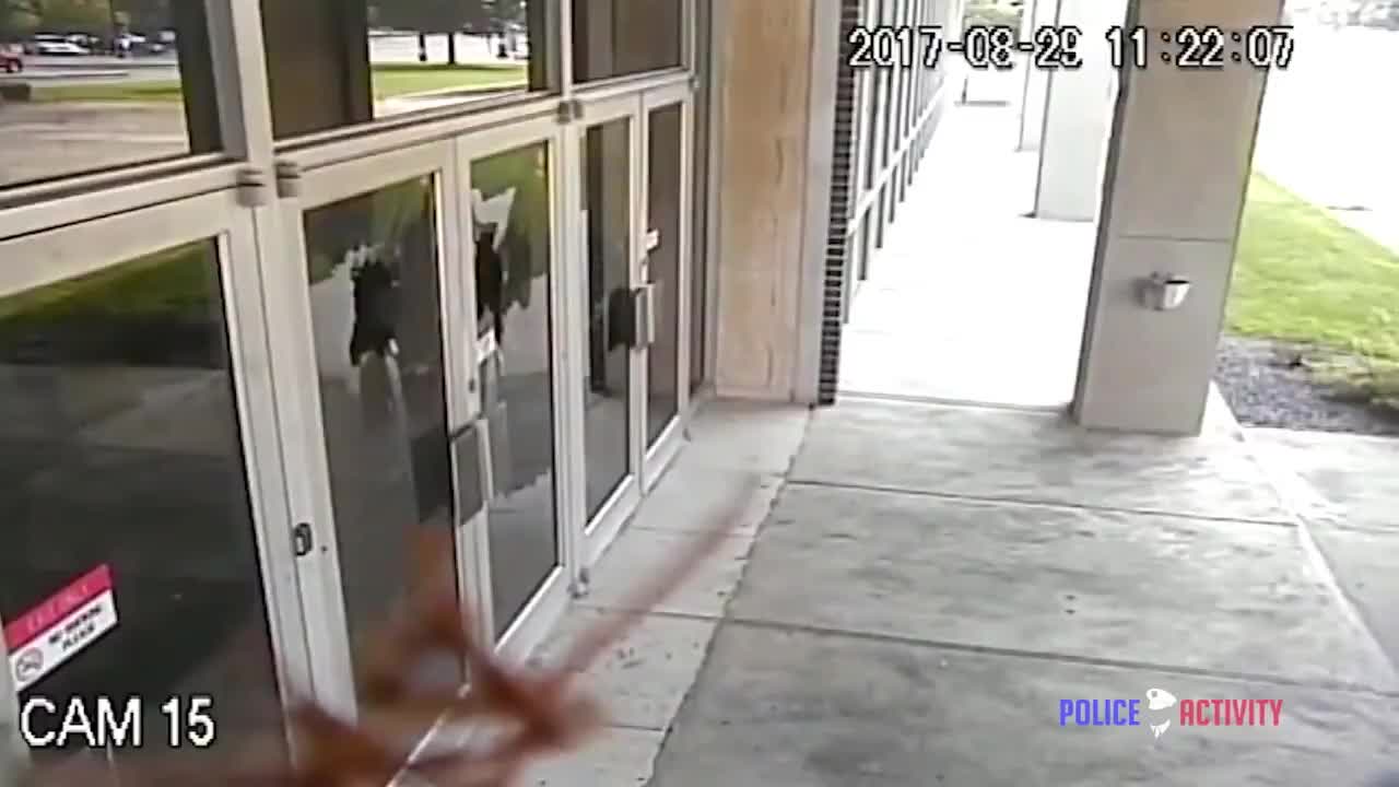 Body & Surveillance Cams Man Attacks Police Station with a Baseball Bat, Gets Shot