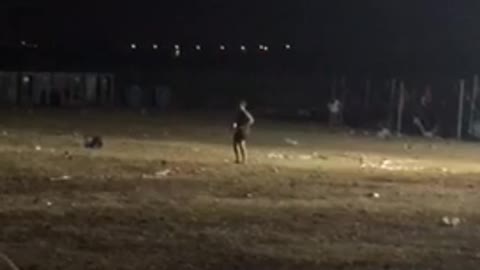 Guy alone in baseball field dancing