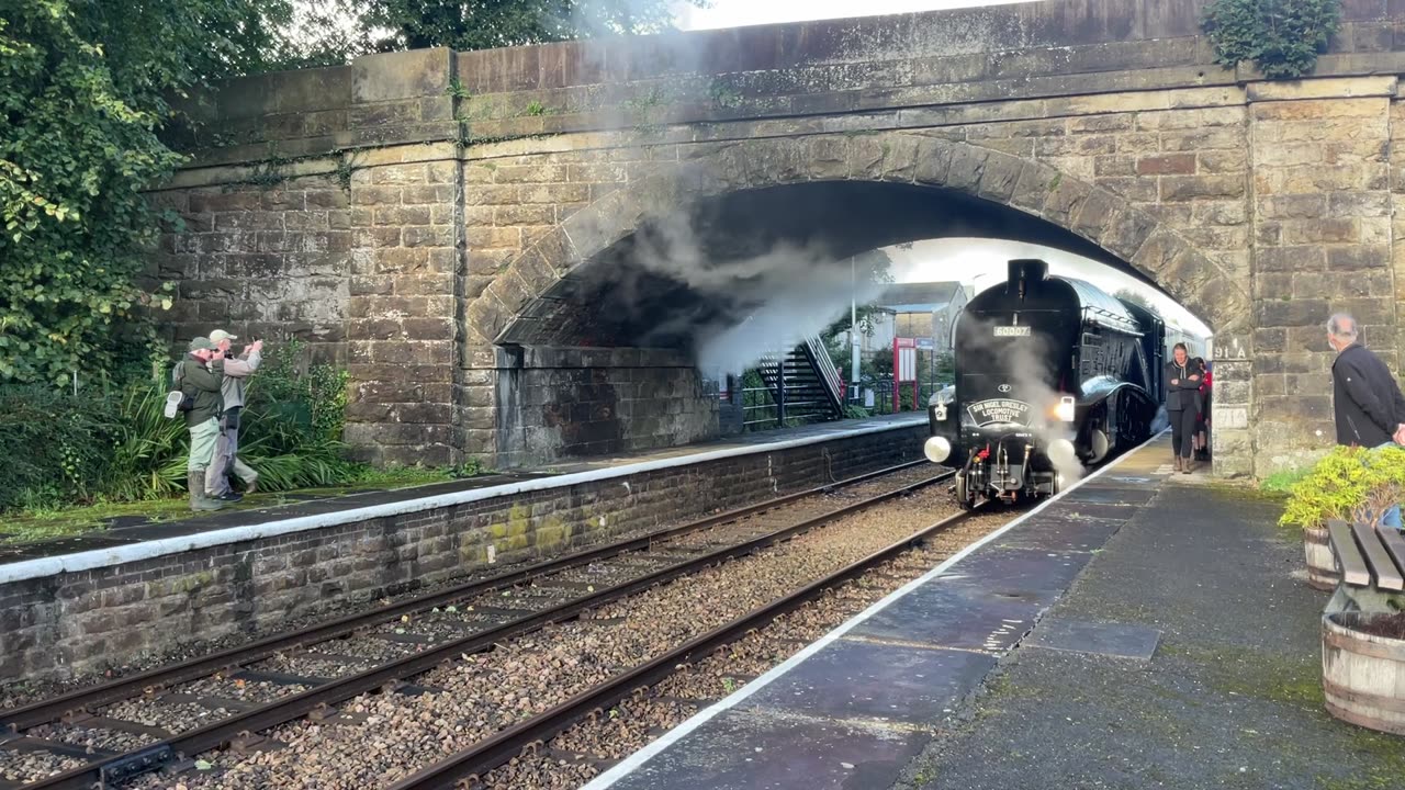 Sir Nigel Gresley filling with water leaving station