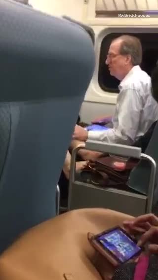 Shoes off feet on subway seat