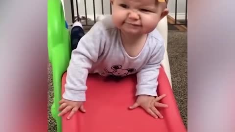 VideoFunny Baby Playing The Failed Slide
