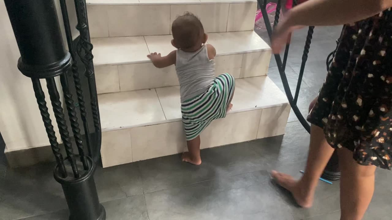 8 Months baby Trying to Go up