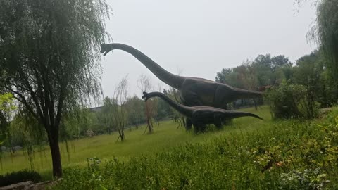 Dinosaurs in the distance are so big