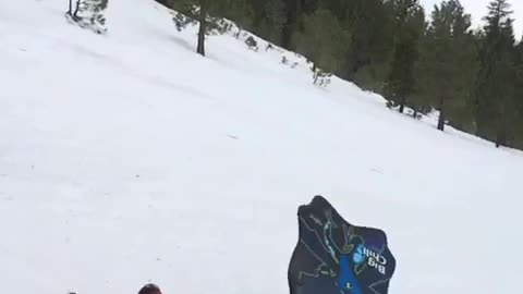 Kid red outfit black sled wipe out