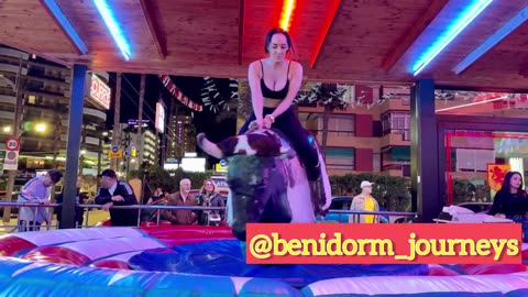 Elastic Girl on Bull in Benidorm _ Bull riding _ Crazy Mechanical Bulls