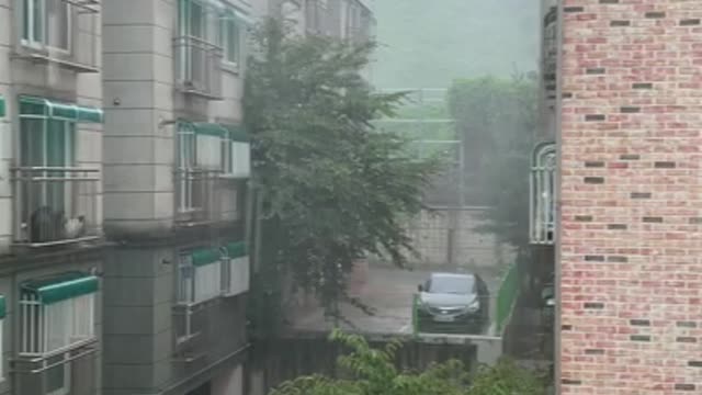 Heavy rain outside the window