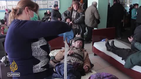 Russians push deeper into Mariupol as locals plead for help