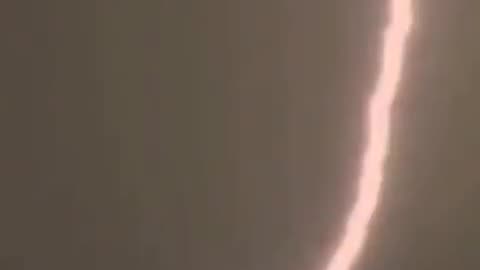 Mecca, Saudi Arabia, dramatic flurry of heavy rain, mighty winds, and electrifying lightning