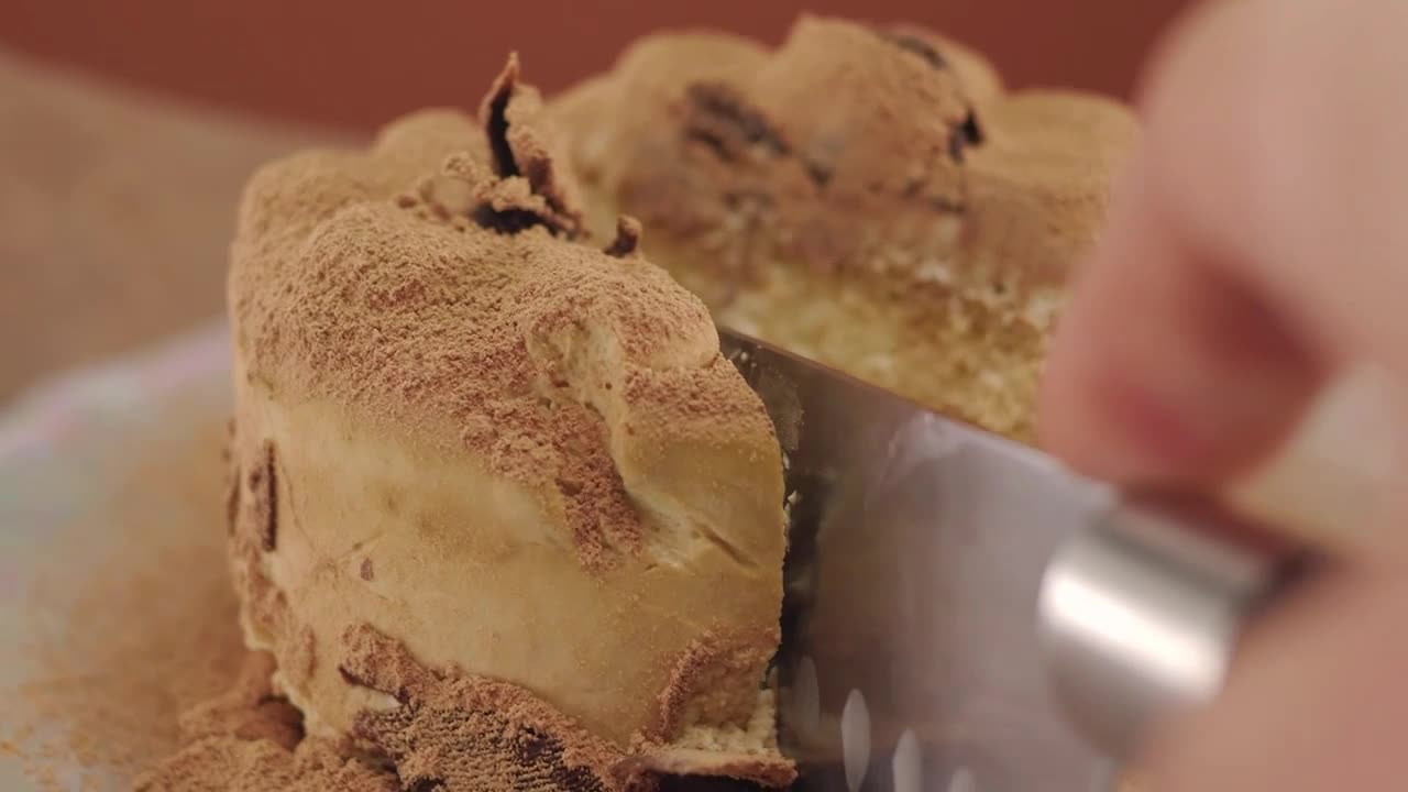 Cutting a little chocolate cake