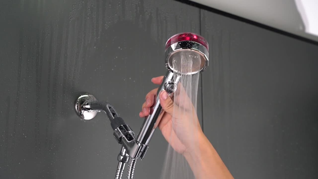 Propeller Driven Shower Head With Stop Button