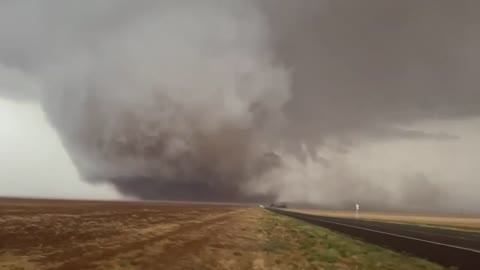 Massive Wedge Tornado Swirling and Churning up Dirt