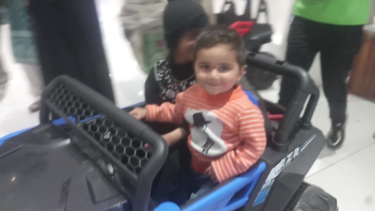 The Children Playing in shopping Mall