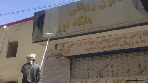 Taliban Order to Paint Over Female Models Pics From Salons Hoardings - Watch Video