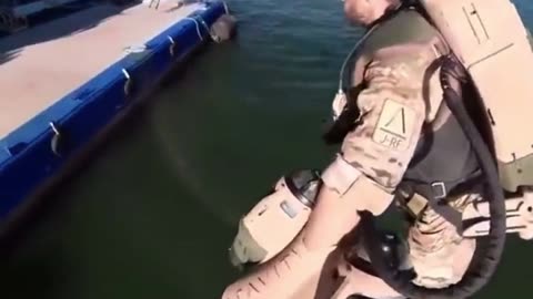 The British Royal Navy using jet suits to fly around HMS Elizabeth as it enters New York harbor