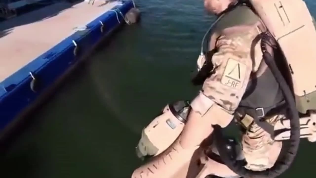 The British Royal Navy using jet suits to fly around HMS Elizabeth as it enters New York harbor
