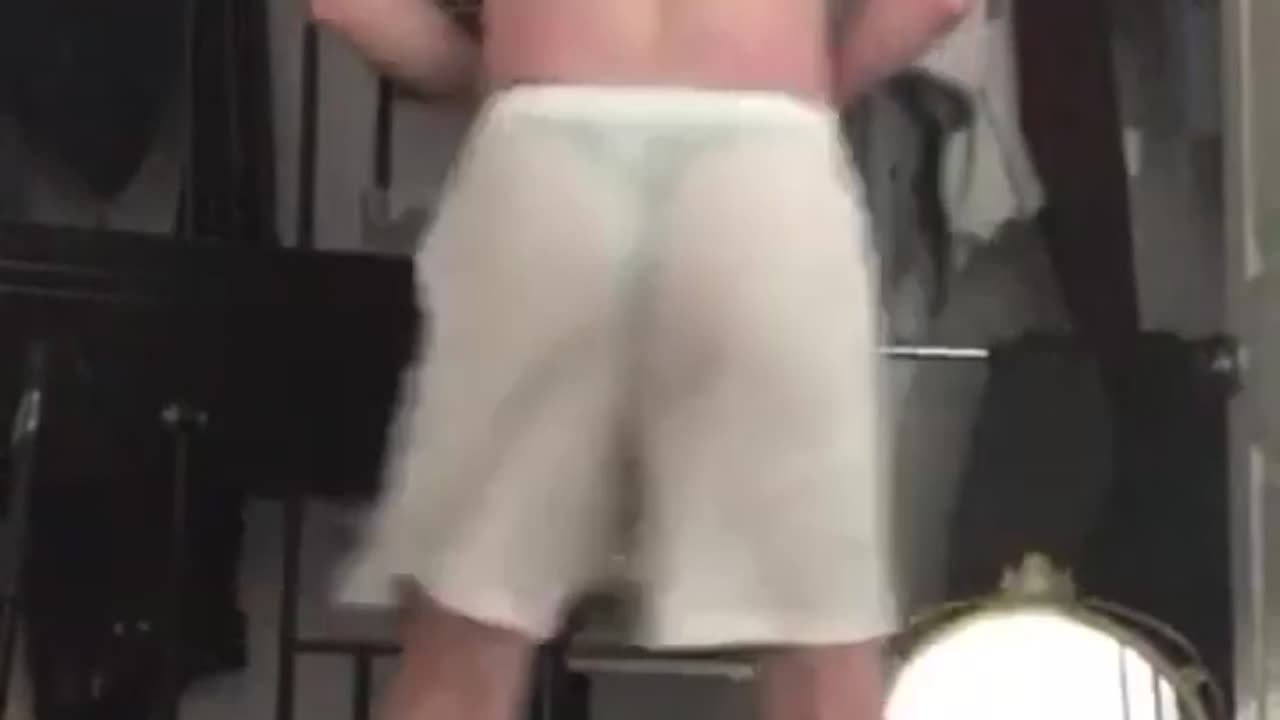 Lifeguard shakes butt in see through shorts with thong!