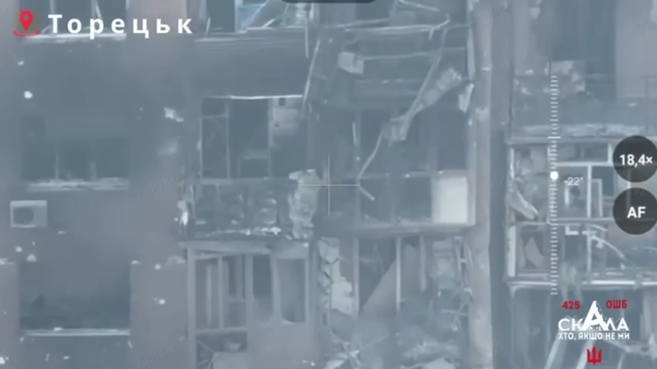 Russian Soldier Tries to Climb Down Side of Destroyed Building