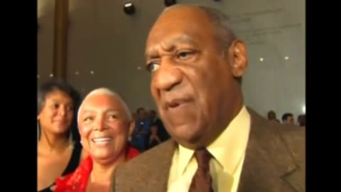 Cosby's wife defends besieged husband