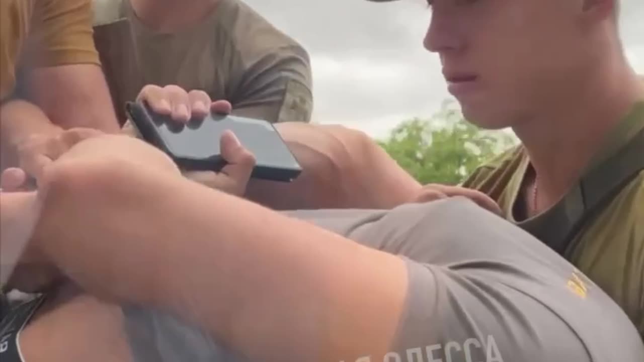 Odessa: Man is zip tied by military, presumably for conscription