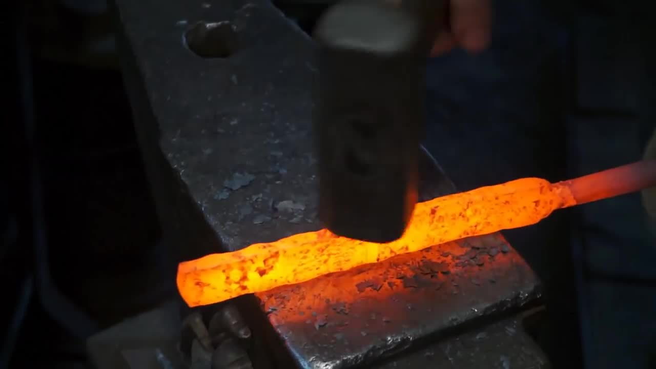 Damascus steel from two tape measures and 100 blades of stationery knives