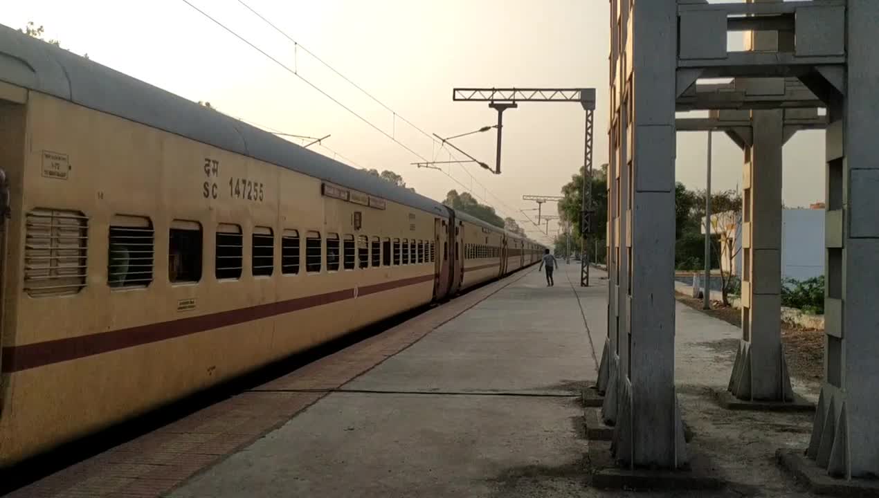 Man Hops off a Slowing Train in an Undesignated Stop