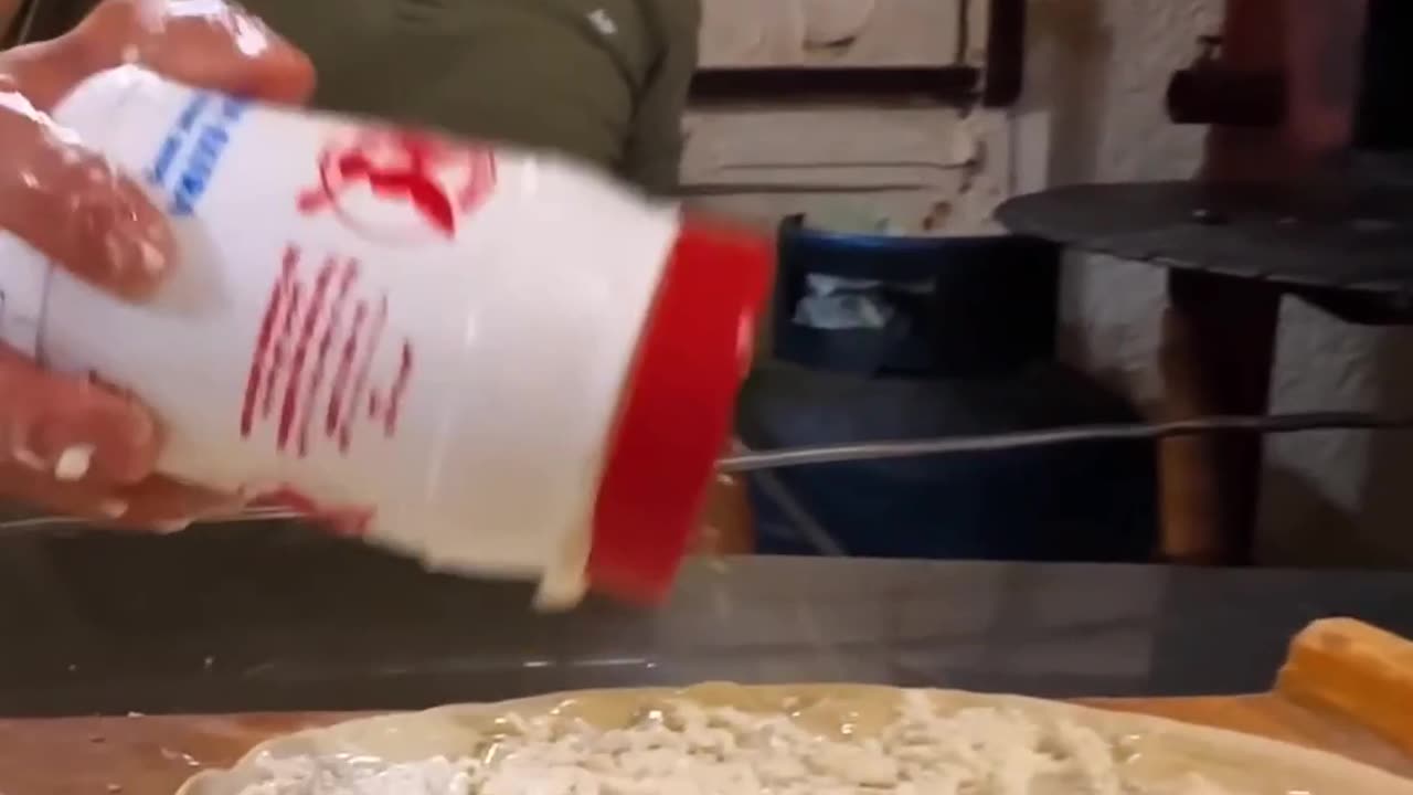 Delicious Lebanese Breakfast Pizza Recipe: Crispy Dough, Cheese, and Sesame Seeds