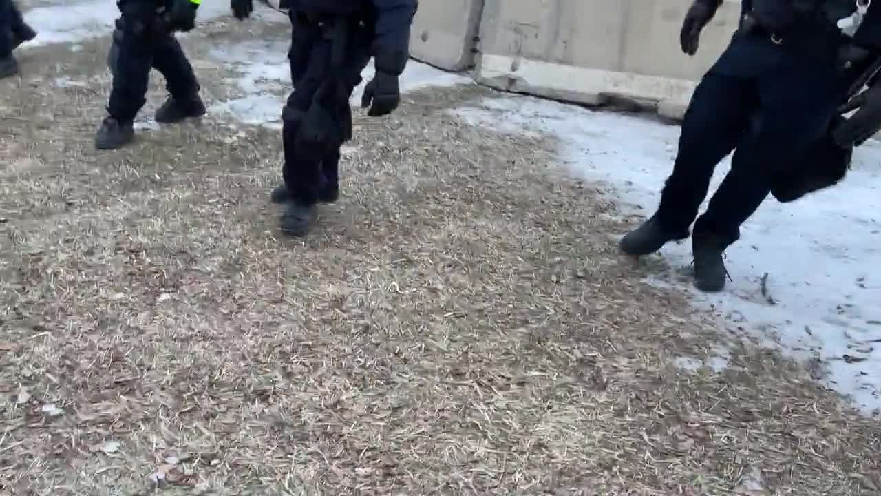 Truckers Ambassador Bridge police moving in