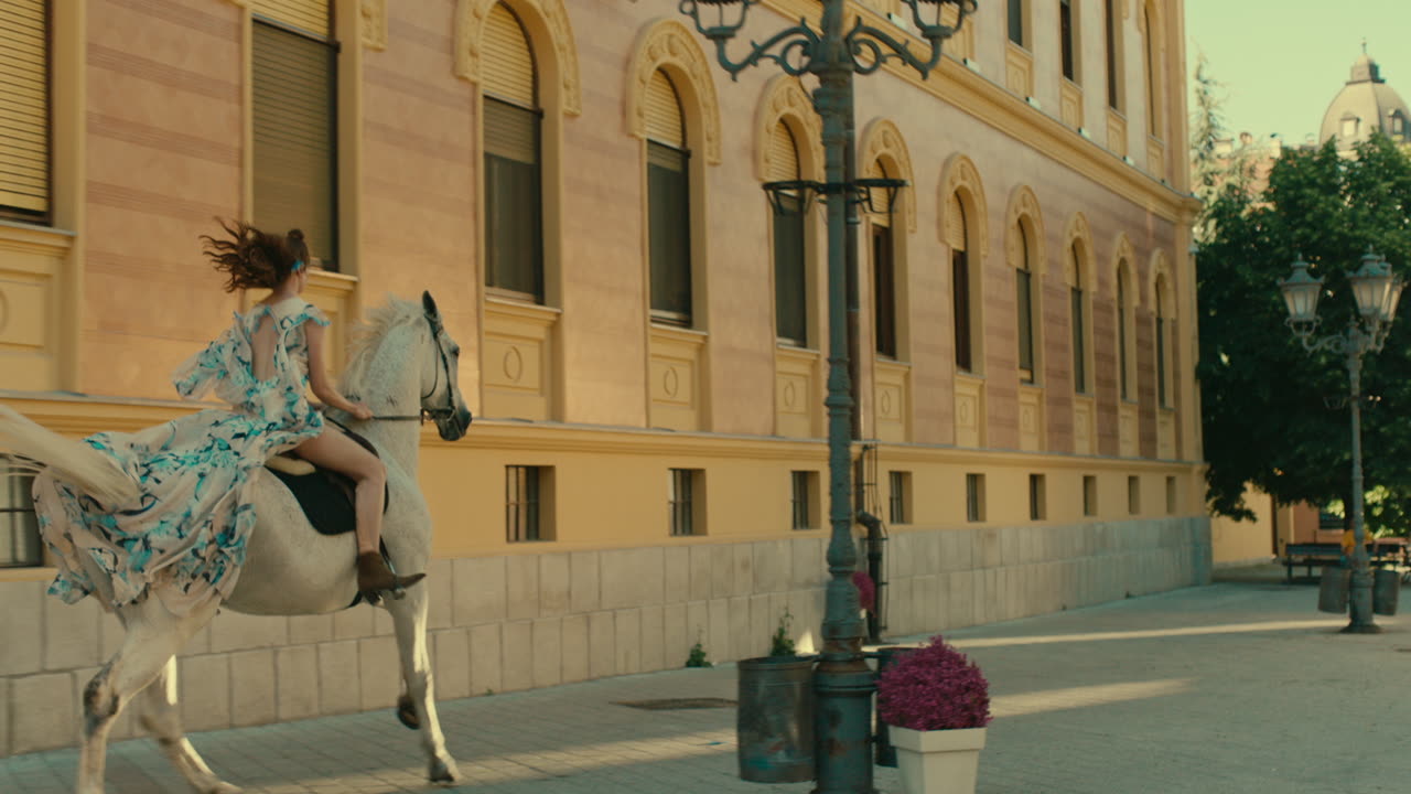 Woman Riding A Horse In The Street