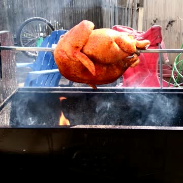 Another rotisserie chicken on the grill