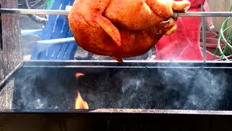 Another rotisserie chicken on the grill