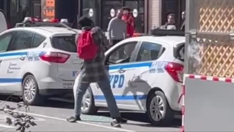 Lunatic Goes Off On NYPD Cruiser, Smashes Windows & Lights In Broad Daylight