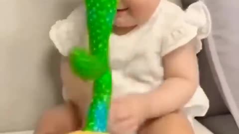 Cute baby playing with cactus toy 😂