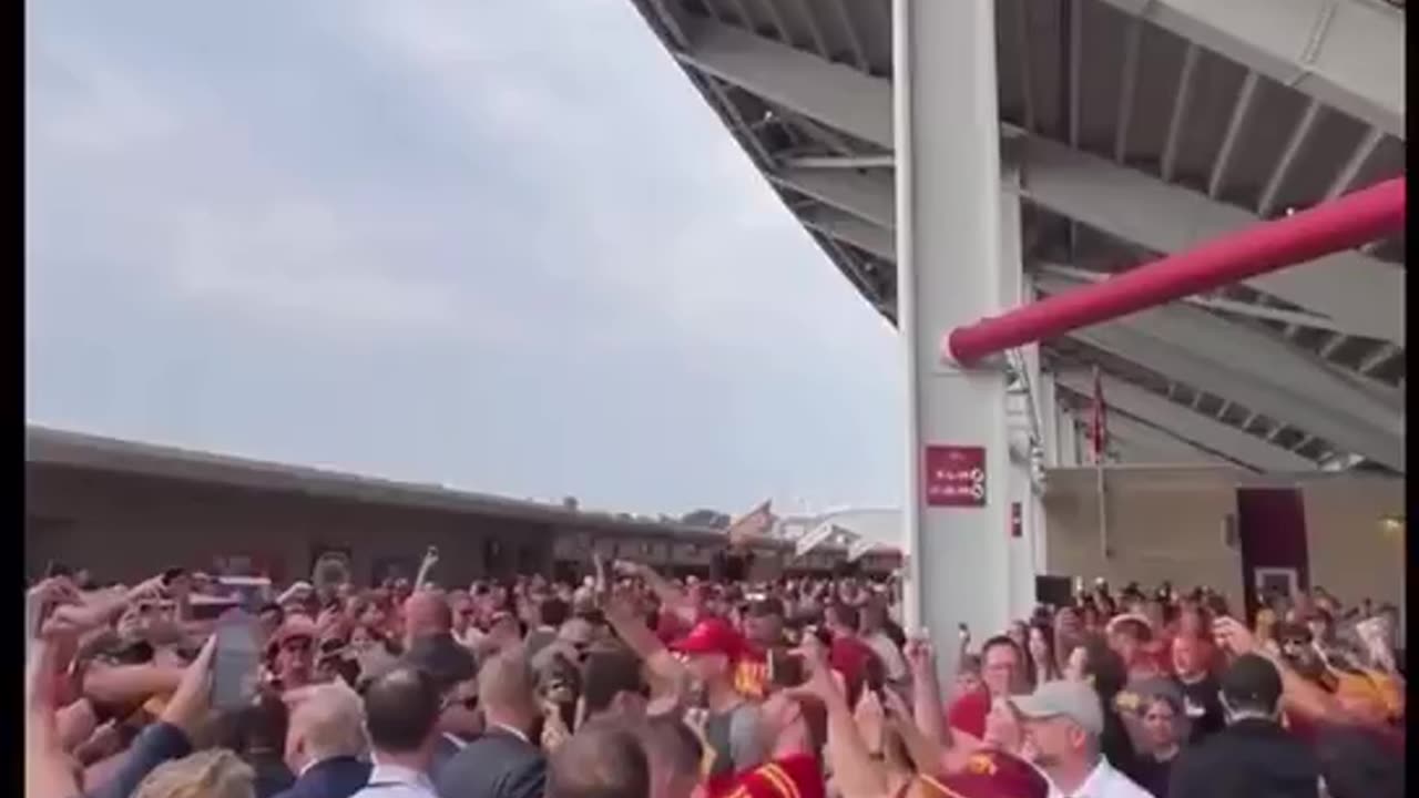 President Trump attending the Iowa Hawkeyes vs Iowa State Cyclones football game.