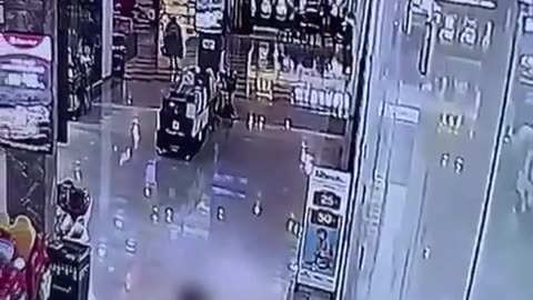 Israeli soldiers attacked and stabbed in a mall, with one opening fire on the terrorist