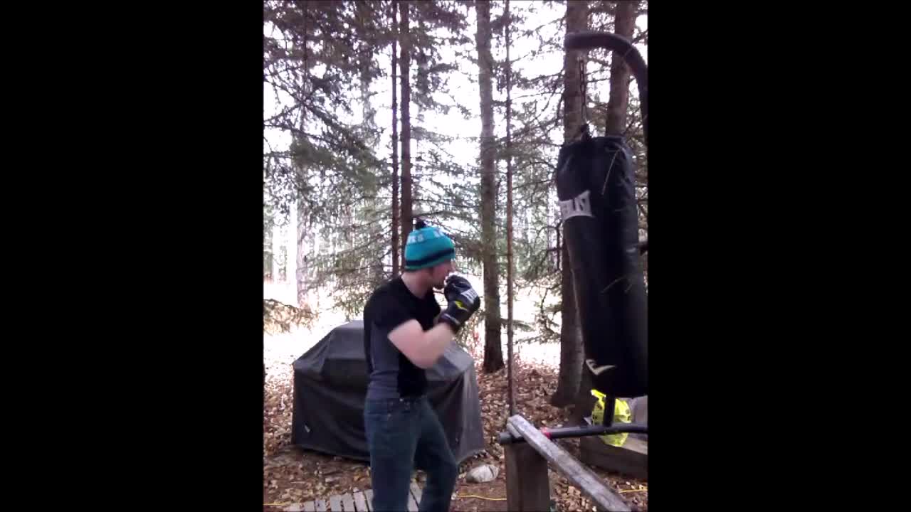 Shots on the heavybag with 8oz gloves