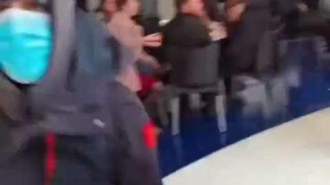 Group of usual suspects with faces covered storm a British native in UK. Is