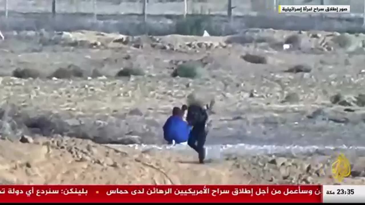 Footage of Hamas releasing a woman and her child