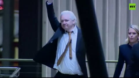 Julian Assange reunites with his wife and father in Canberra.