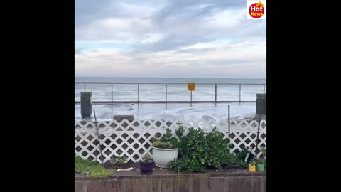 1/16/2022 Large waves crash against the shore of Pacifica