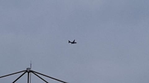 an airplane flying in the sky