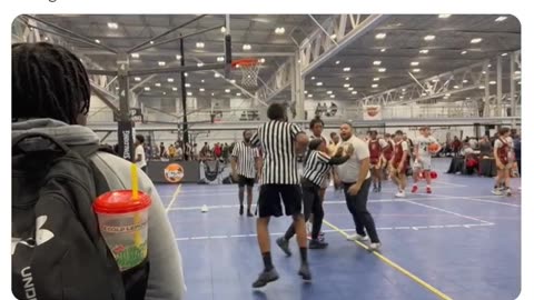 Youth basketball coach starts fight with referee